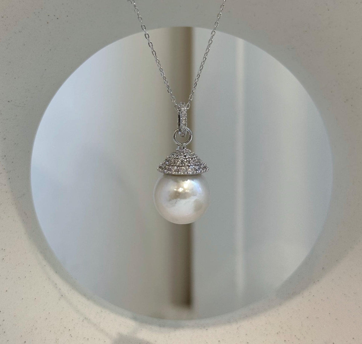 Genuine 13.6mm Edison pearl brooch that converts into a necklace pendant