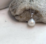 Close-up of 12.6mm South Sea pearl with flawless mirror luster