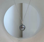 Genuine saltwater Tahitian pearl pendant with S925 sterling silver setting.