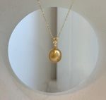 Genuine 10.2mm South Sea deep gold pearl pendant with mirror luster and gold-plated S925 sterling silver.