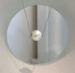 Elly’s 12.2mm Australian South Sea white pearl floating pendant in Au750 18K gold