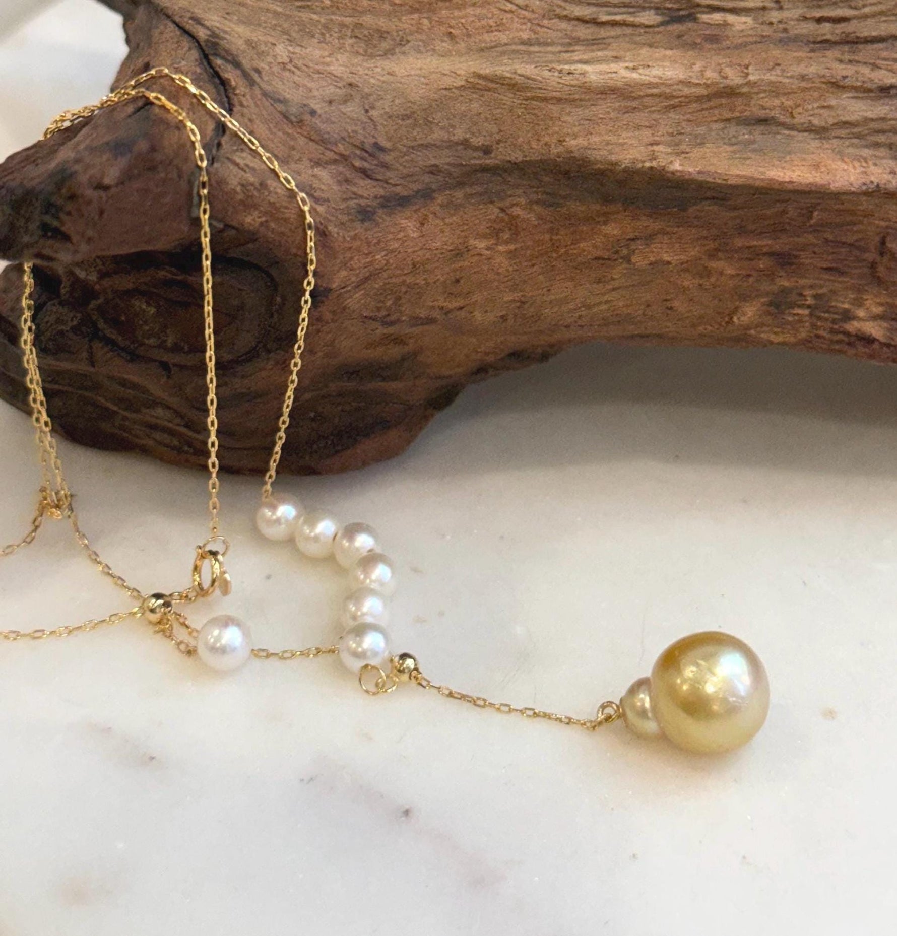 Mirror luster pearl Y necklace with eight genuine pearls and S925 sterling silver chain.