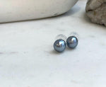 Luxury Tahitian pearl earrings presented as a gift for her