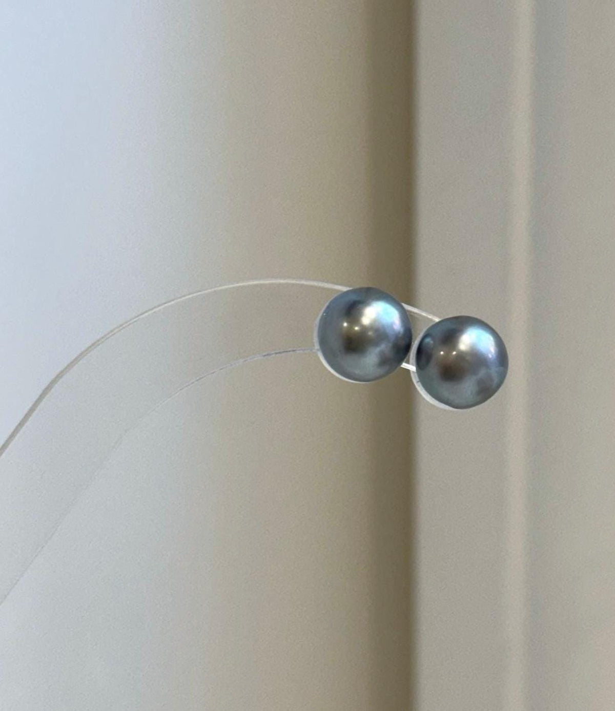 Mirror luster Tahitian pearl earrings with classic minimalist design