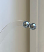 Mirror luster Tahitian pearl earrings with classic minimalist design
