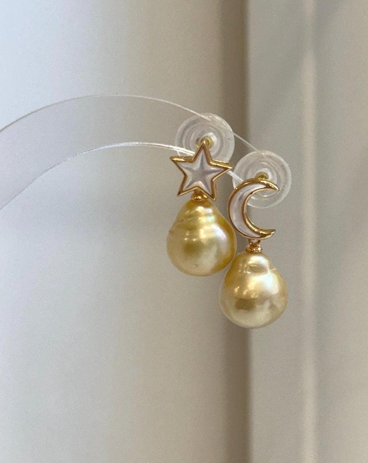 Genuine 11.4mm South Sea Golden Pearl earrings in elegant star and moon S925 sterling silver setting.