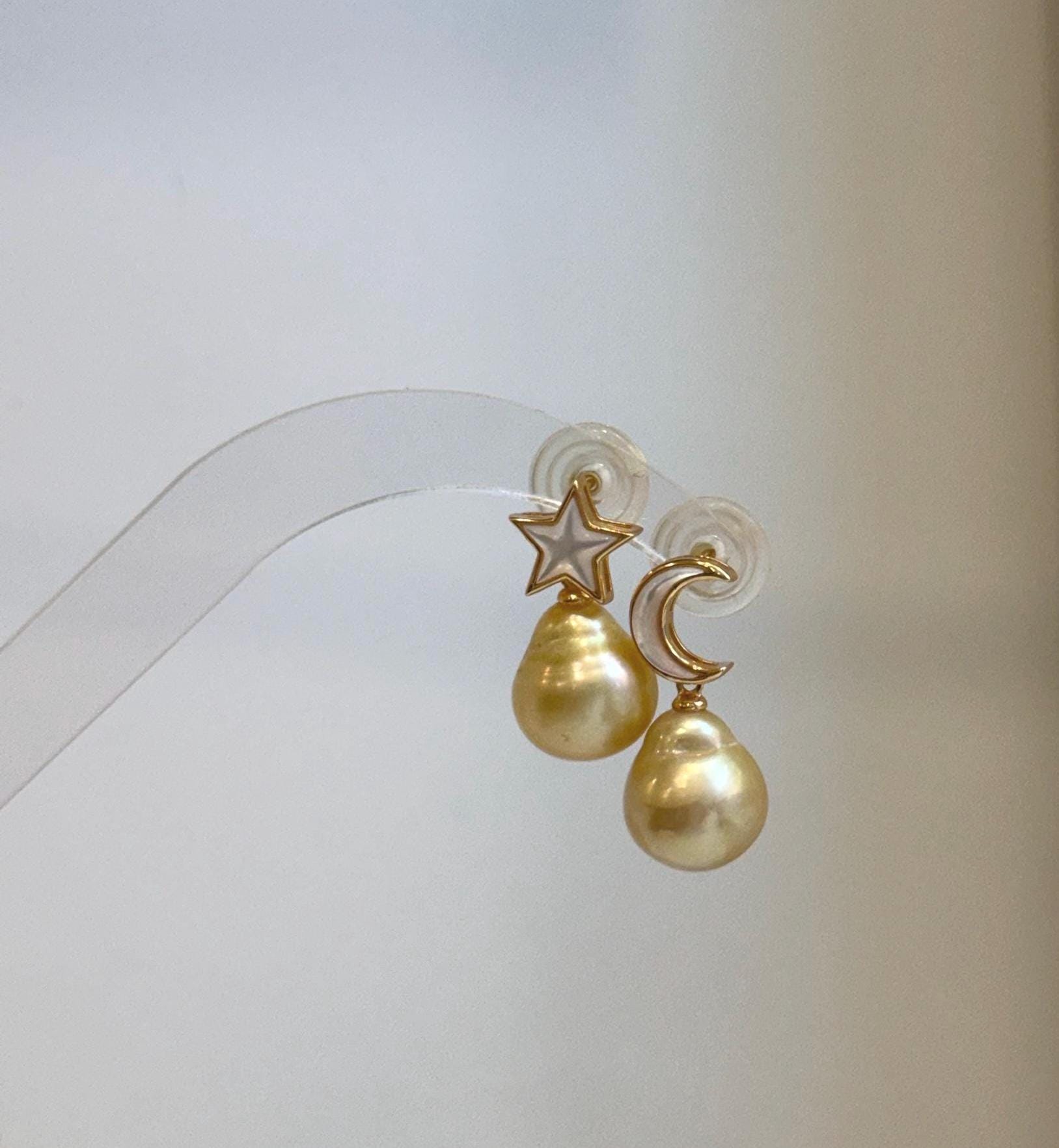 Elegant star and moon pearl earrings featuring premium South Sea Golden saltwater pearls.