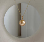 Mirror luster South Sea golden pearl set in solid 18K gold