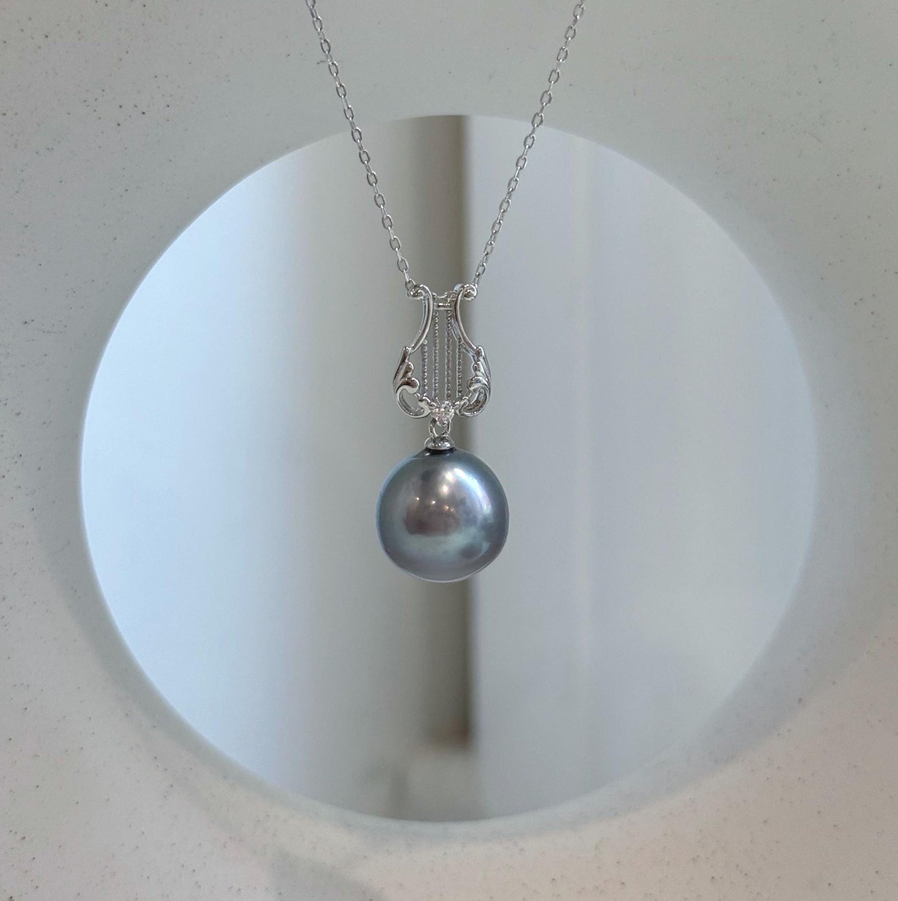 1. 6mm Tahitian platinum pearl pendant with mirror luster on S925 sterling silver lyre necklace.