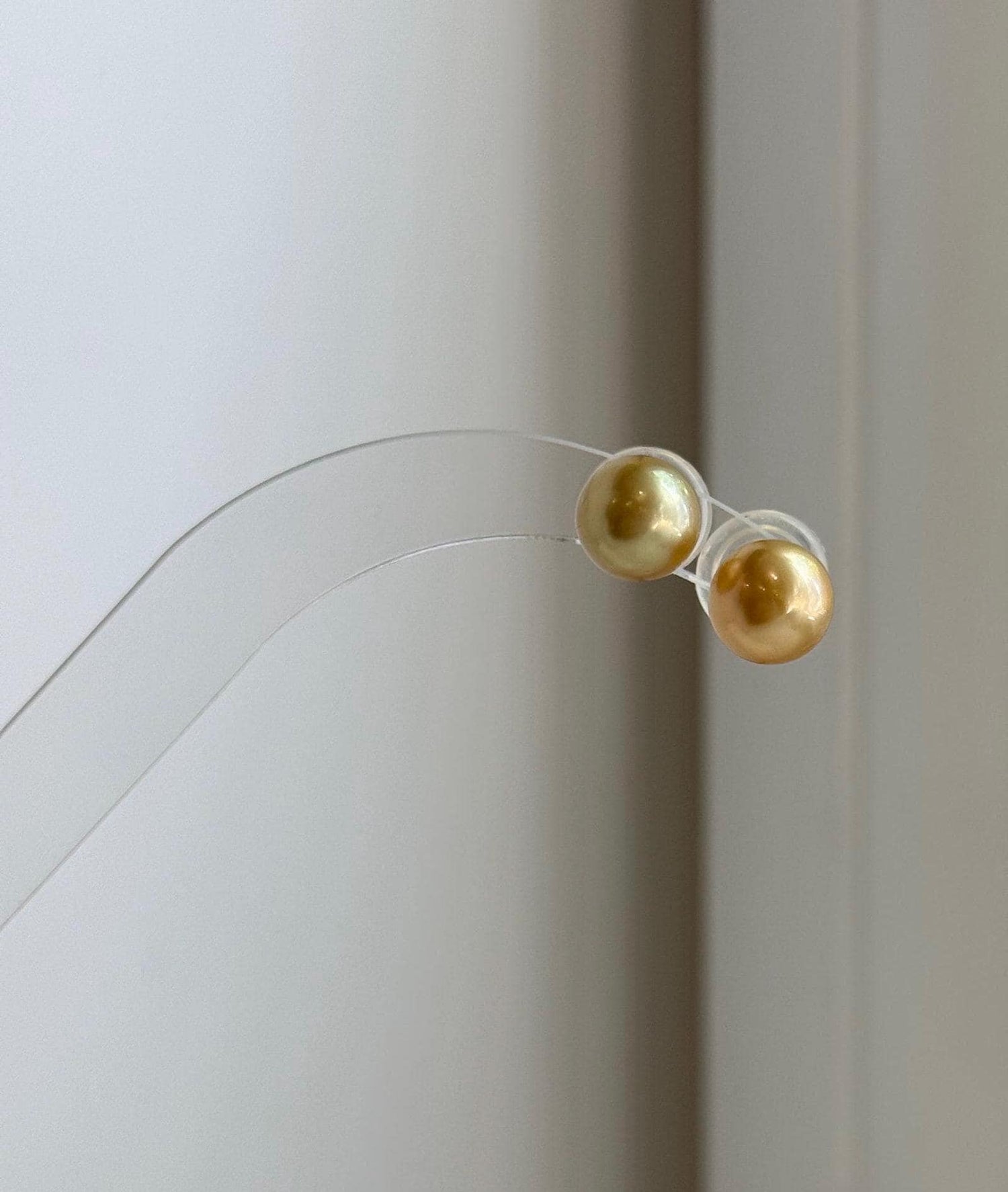 1. 8mm South Sea deep gold pearl stud earrings with mirror luster