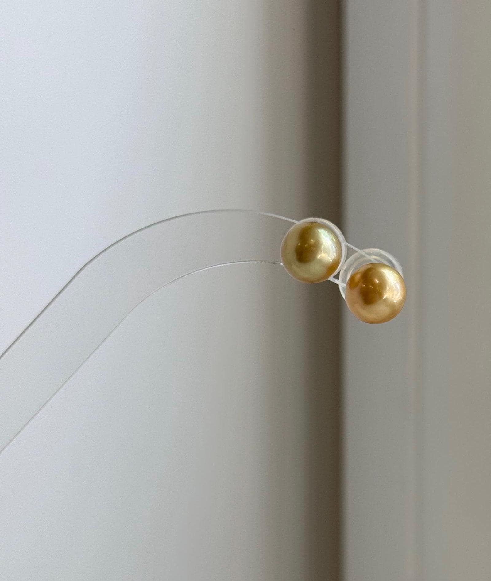 1. 8mm South Sea deep gold pearl stud earrings with mirror luster