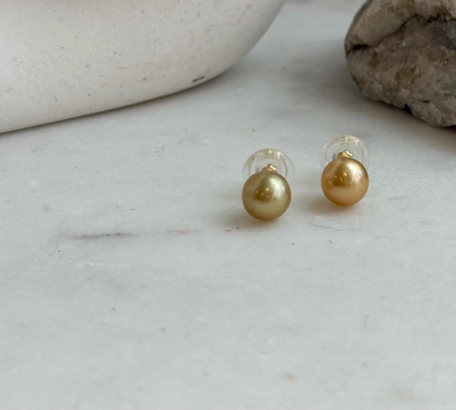 Luxury deep golden pearl studs with sterling silver settings