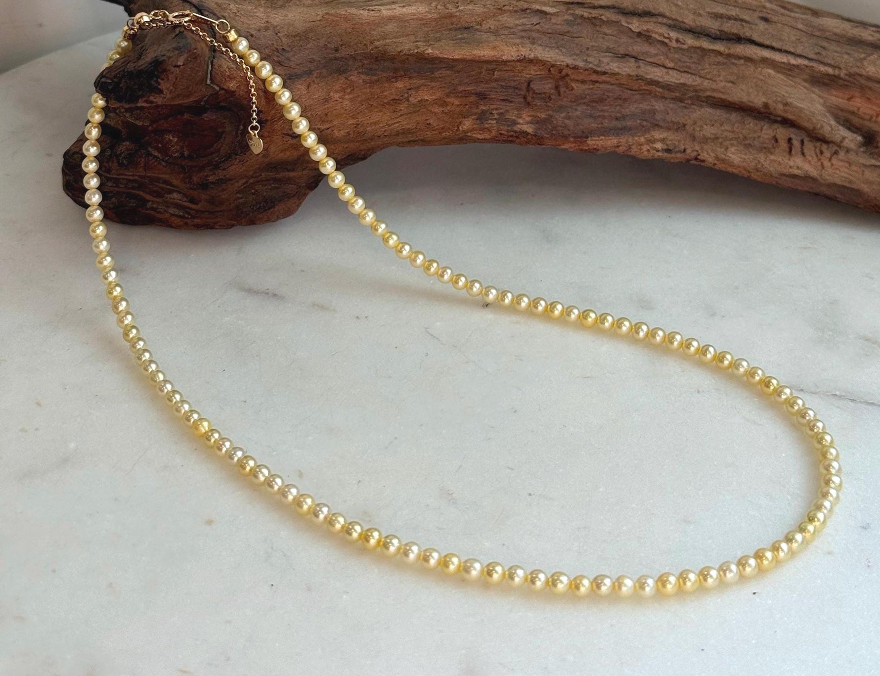 Natural freshwater golden pearl strand with beautiful mirror luster