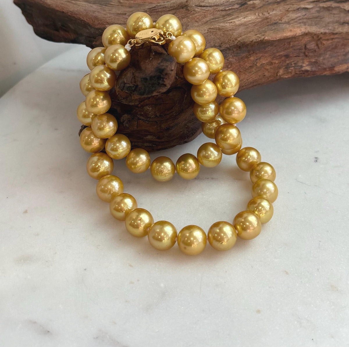 39 genuine Edison freshwater pearls in deep tea golden color