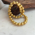 39 genuine Edison freshwater pearls in deep tea golden color