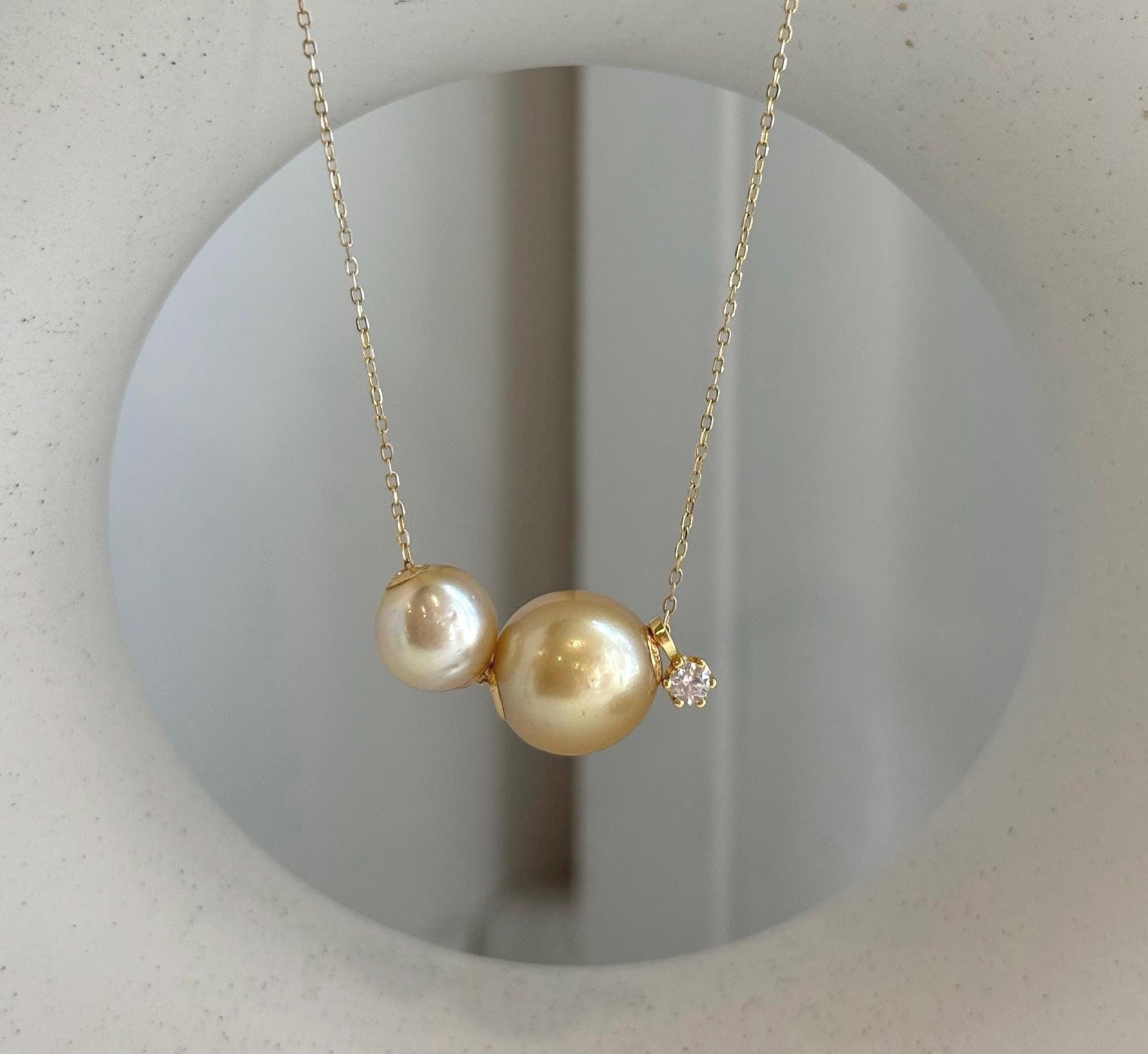 Double South Sea golden pearl floating pendant with 18K gold accents