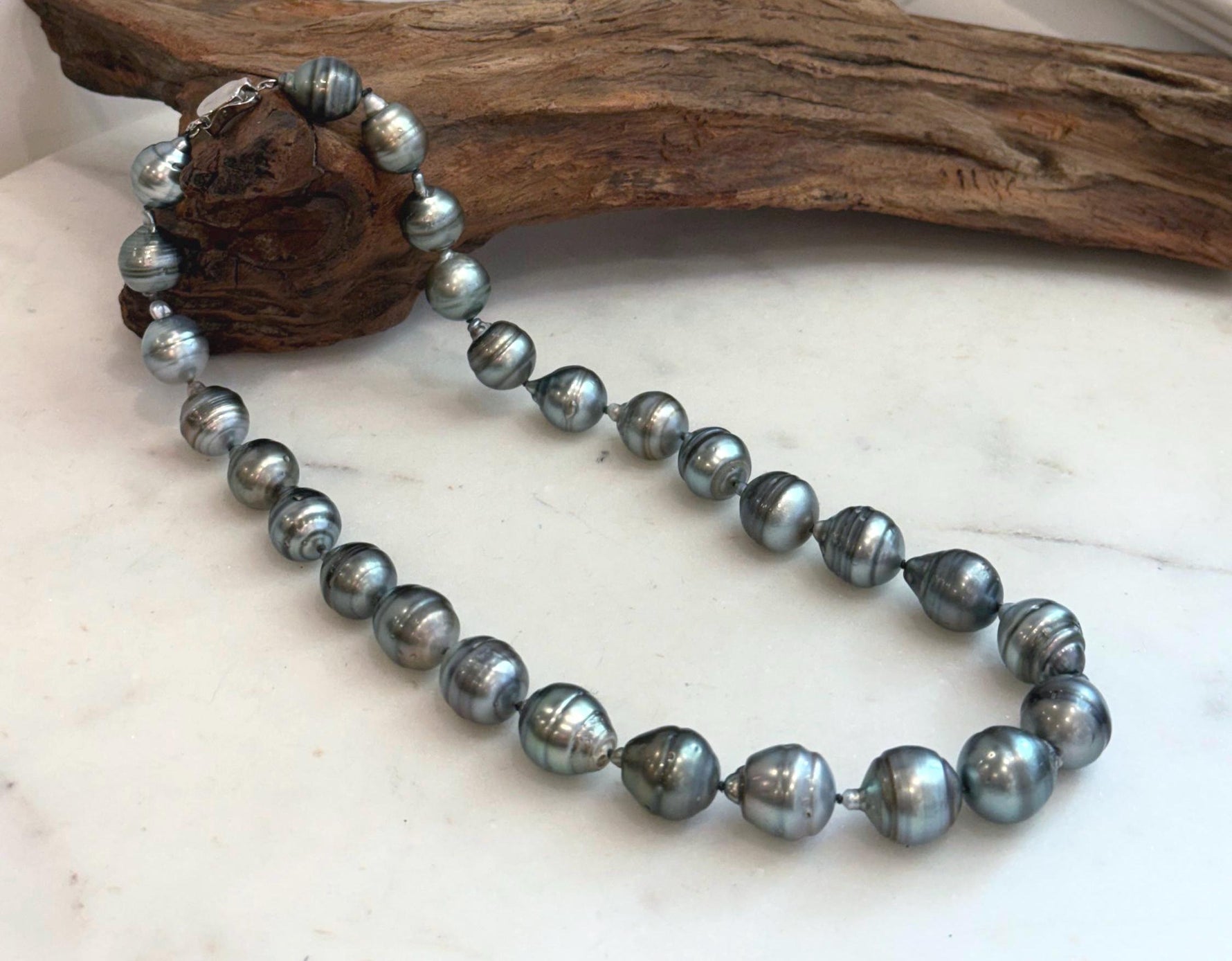 Hand knotted Tahitian pearl necklace with large round saltwater pearls