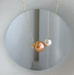 Mirror luster double pearl floating pendant with silver chain