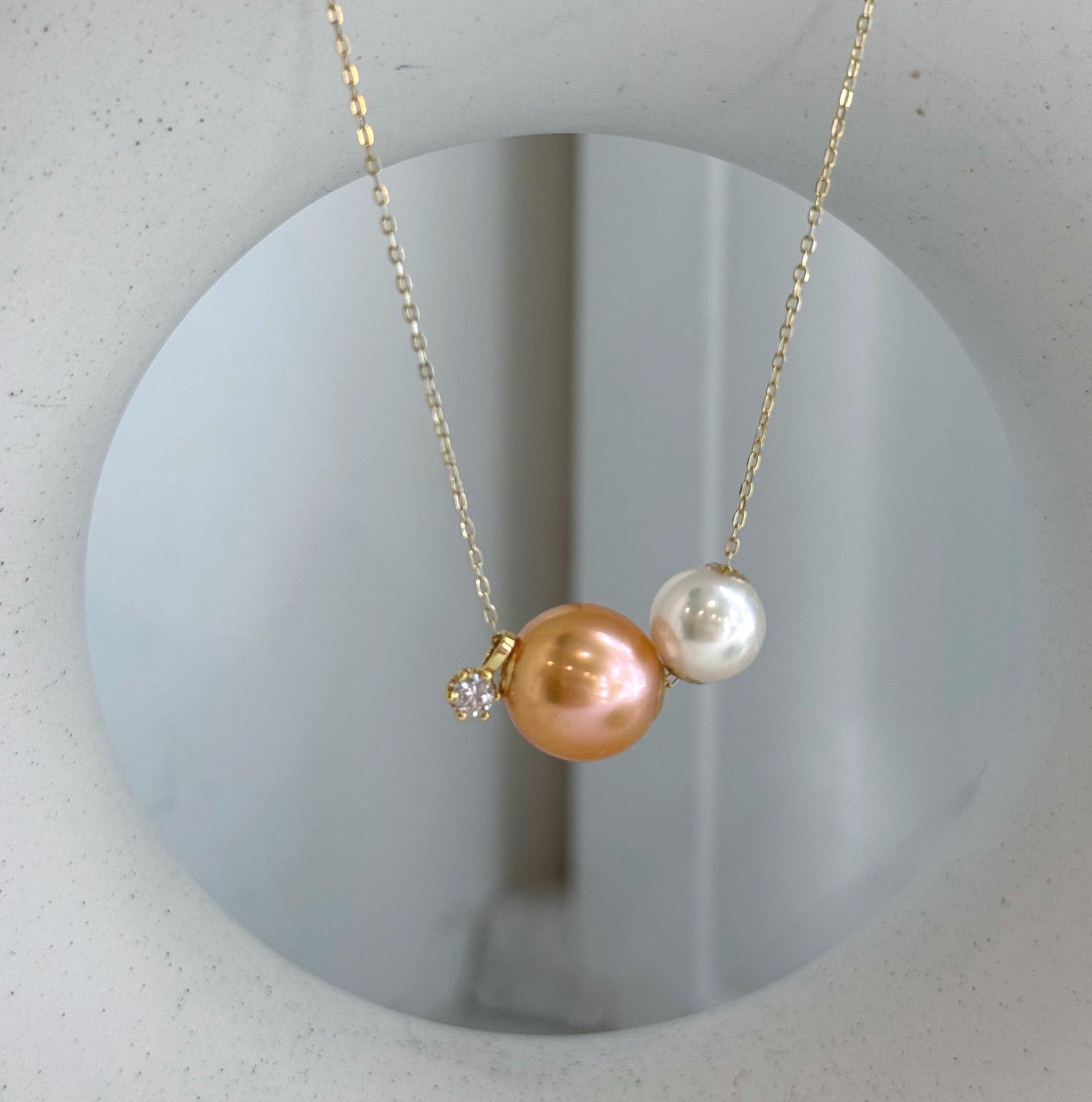 Mirror luster double pearl floating pendant with silver chain