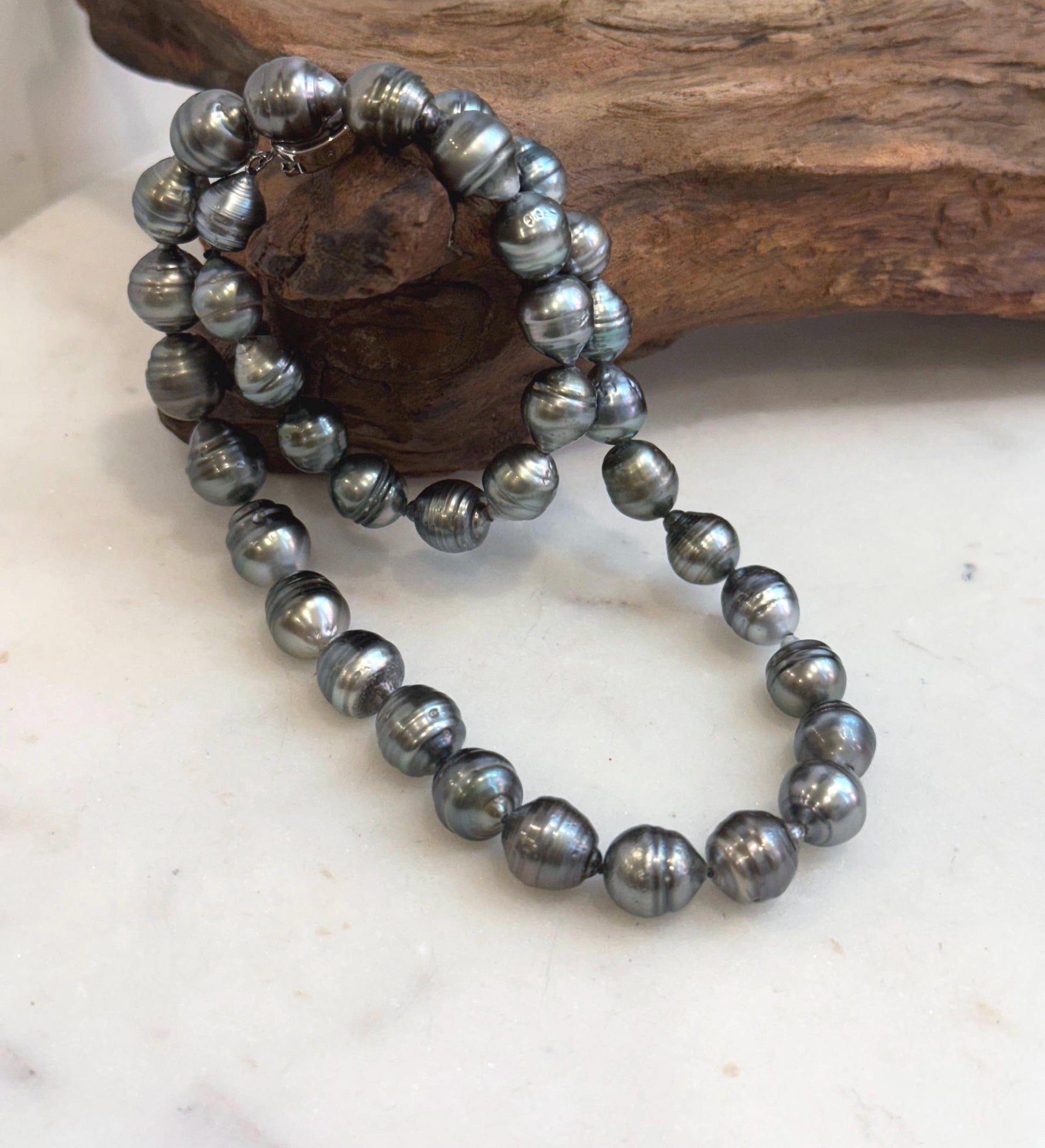Luxury Tahitian pearl strand necklace featuring 37 genuine ocean pearls