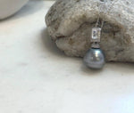 Tahitian platinum pearl pendant featuring beautiful extreme luster
