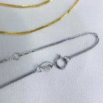 Delicate 18K gold Chopard chain featuring a polished finish and adjustable 17.7-inch necklace length.