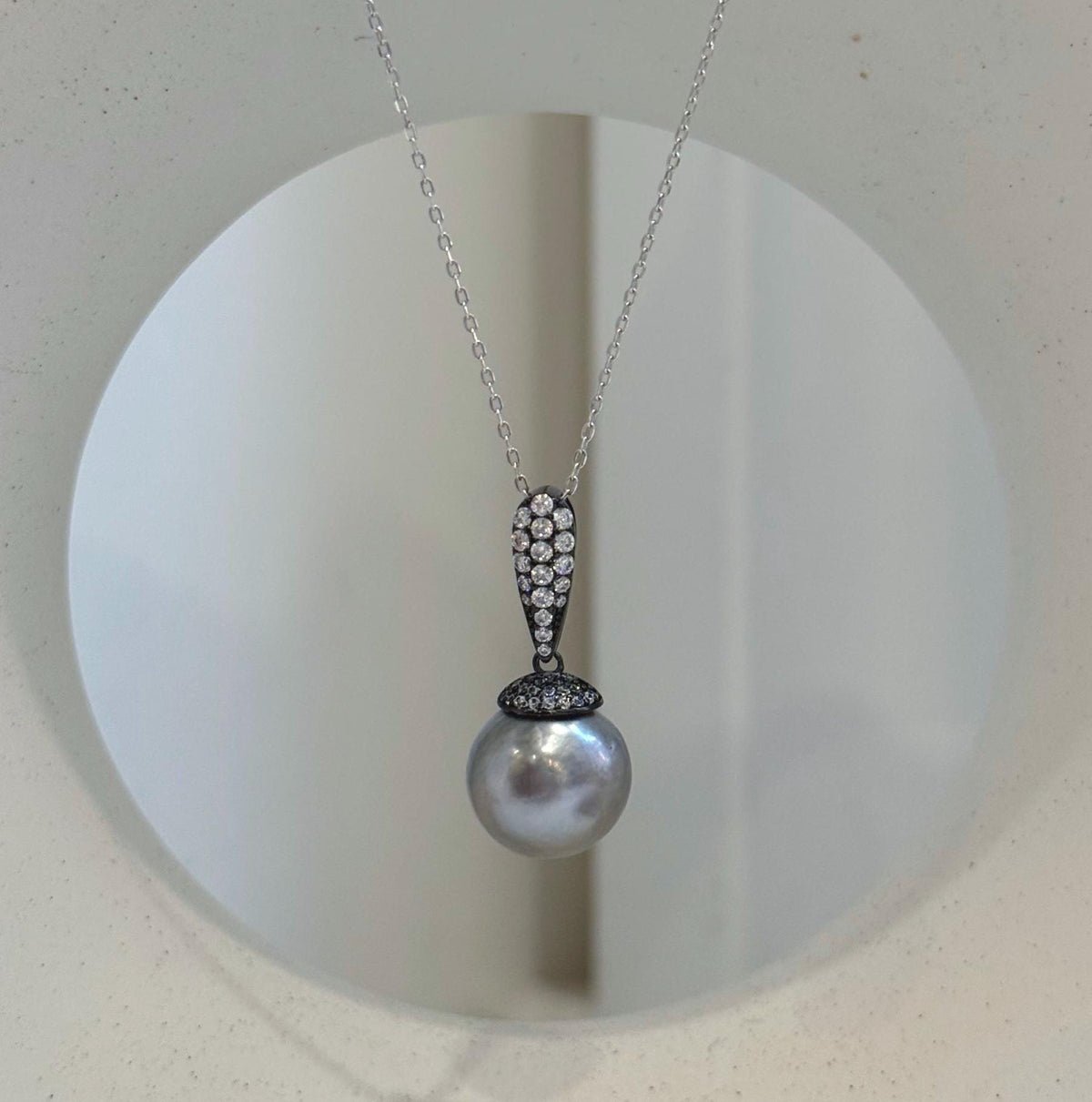12. 5mm Tahitian platinum pearl cool pendant with extreme luster