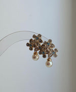 Genuine 6.4mm Akoya pearl flower stud earrings with brilliant mirror luster.