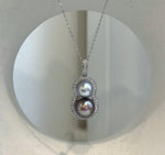Genuine Tahitian saltwater pearl pendant featuring beautiful color and extreme luster.