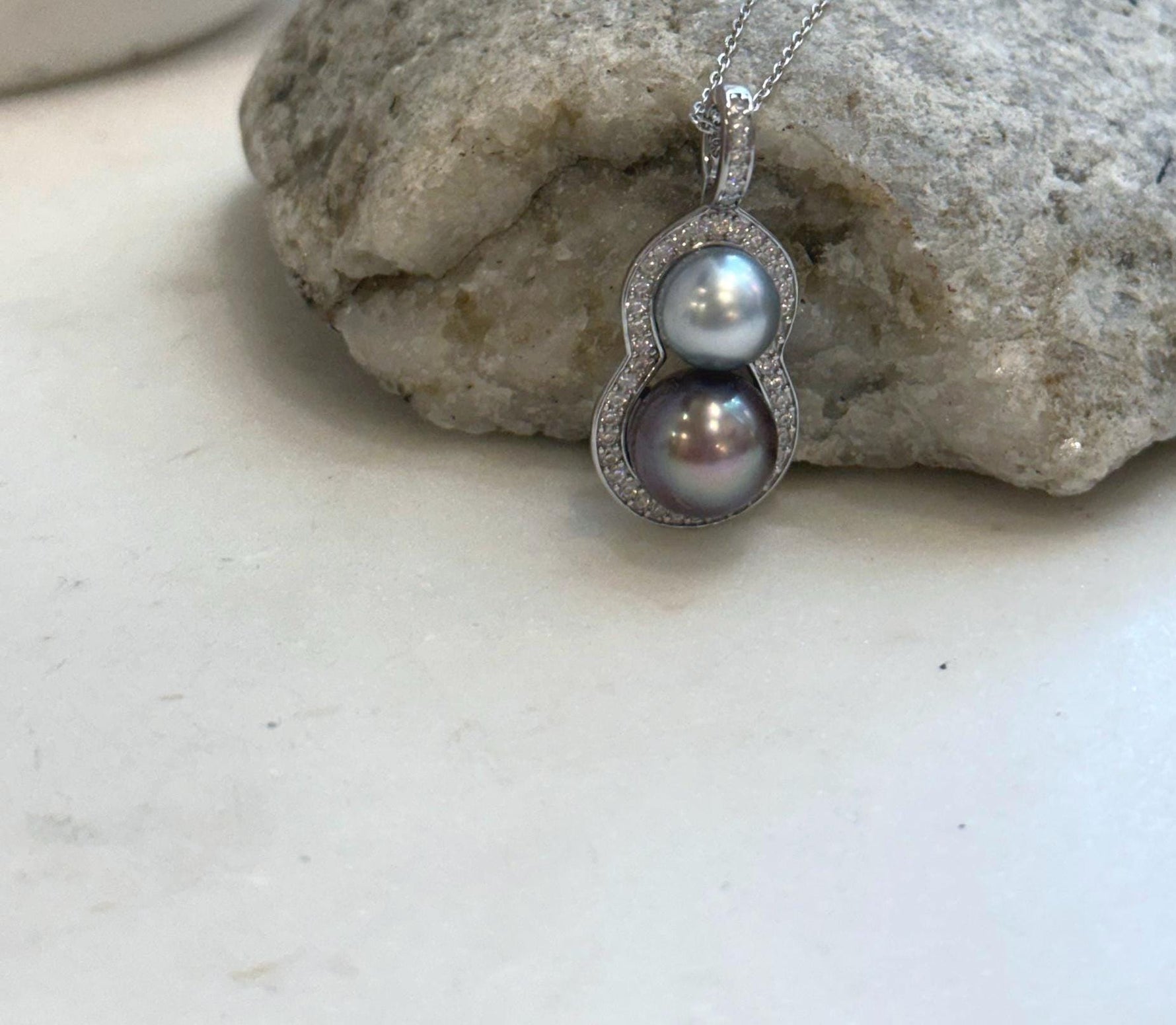 Double black Tahitian pearl pendant with an elegant S925 sterling silver setting.