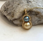 Natural saltwater pearl pendant featuring two contrasting ocean pearls