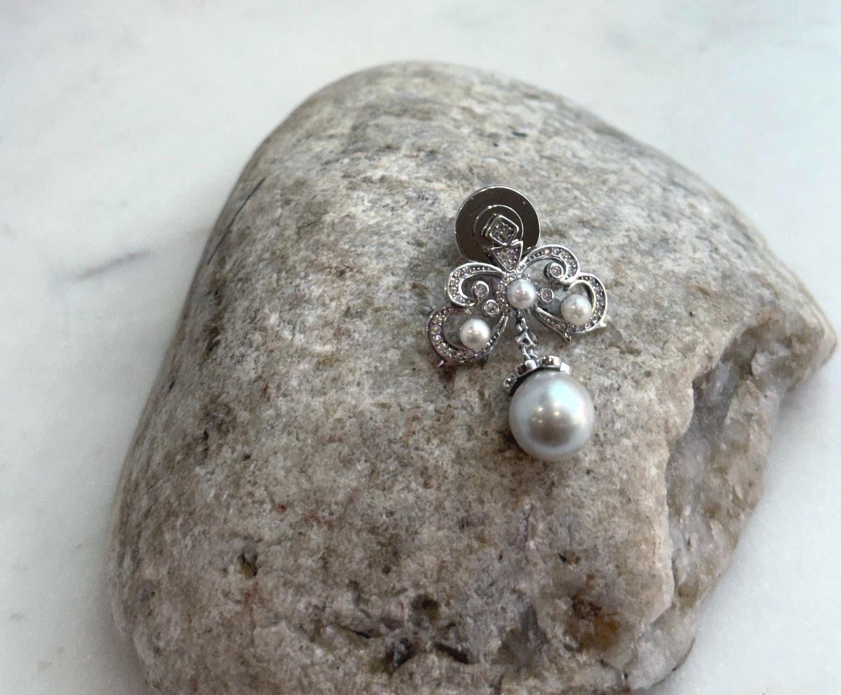 Vintage pearl brooch for coats, scarves, dresses, and blazers.