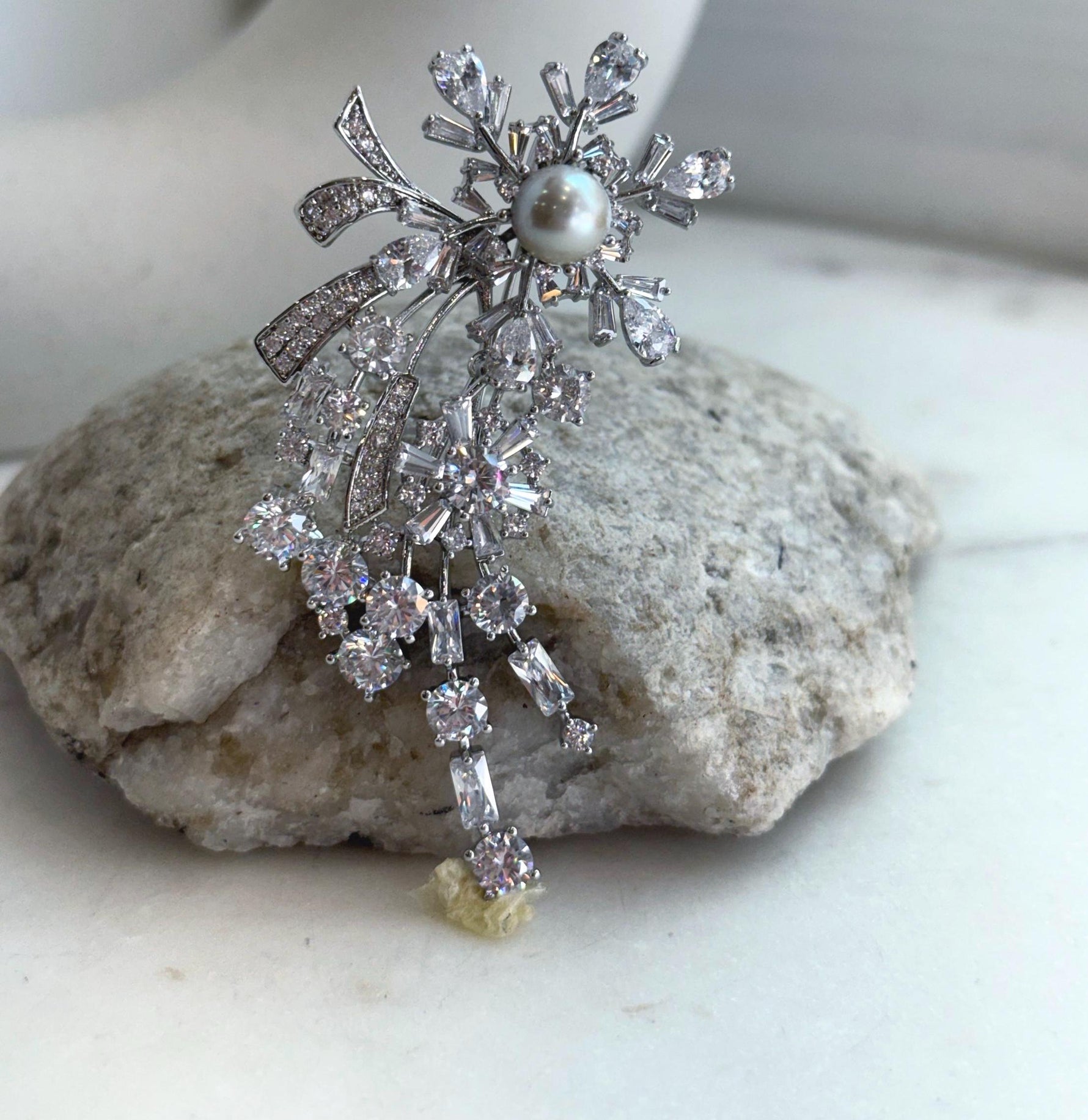 Luxury silver Tahitian pearl pendant brooch for formal occasions.