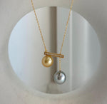 Contemporary double pearl pendant with exceptional mirror luster.