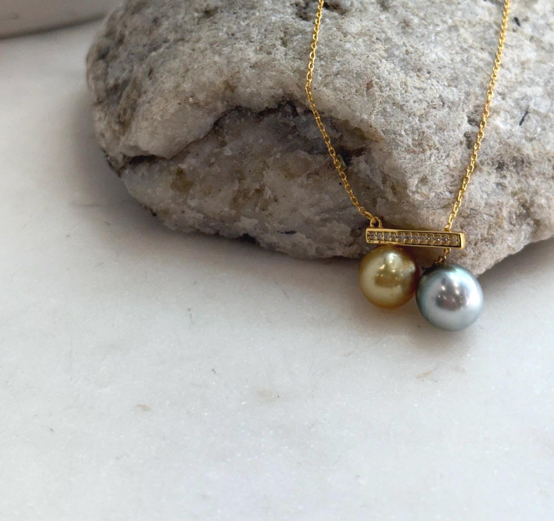 Fine sterling silver pendant showcasing authentic ocean pearls.