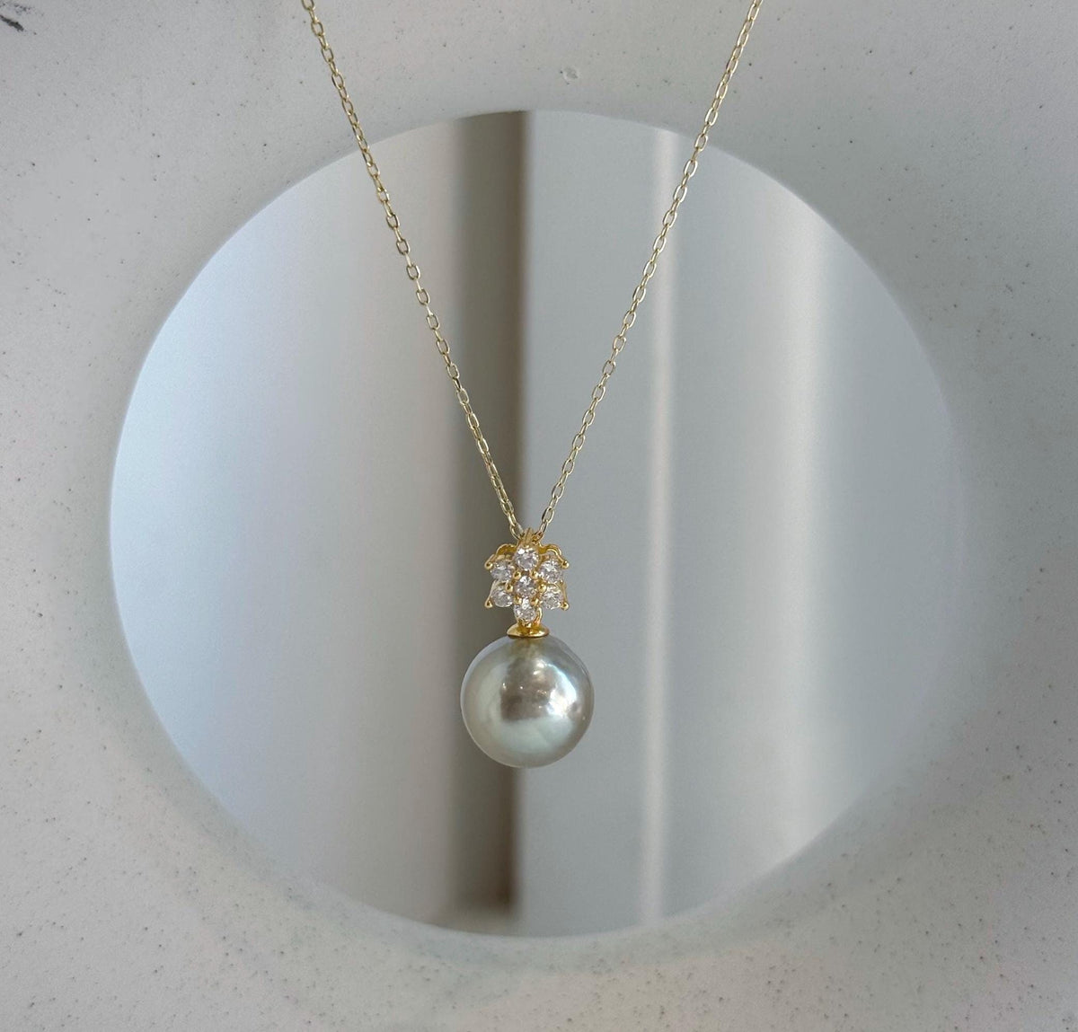 Luxury genuine Tahitian pearl pendant for women in polished S925 sterling silver.