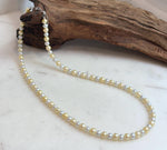 4. 3–5.5mm golden silver freshwater pearl necklace with mirror luster and S925 sterling silver clasp.