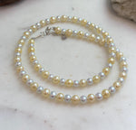 19.1 inch golden silver freshwater pearl strand necklace with beautiful mirror luster.