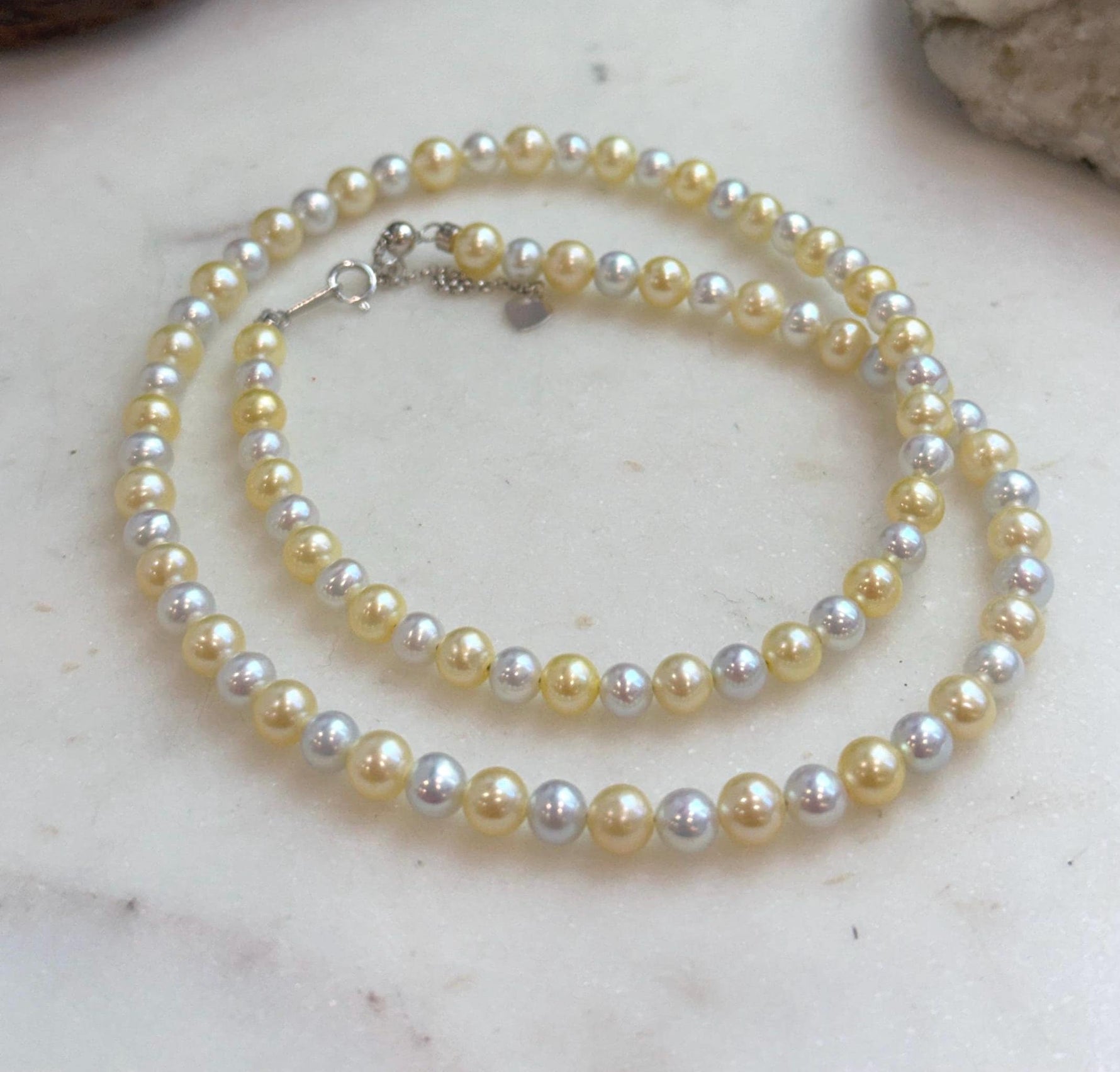 19.1 inch golden silver freshwater pearl strand necklace with beautiful mirror luster.