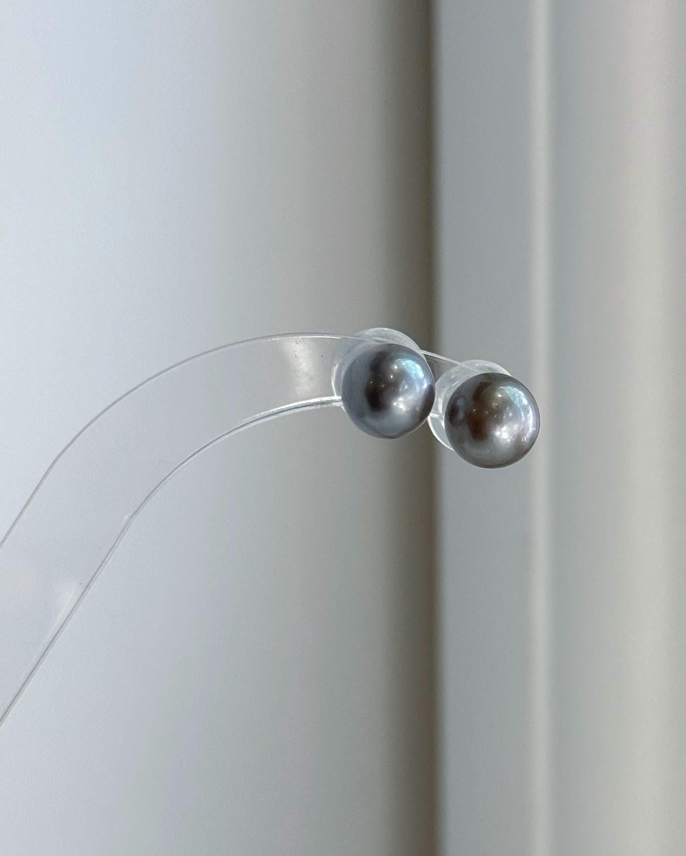 Genuine 9.1mm Tahitian platinum pearl stud earrings with extreme mirror luster in S925 sterling silver.