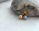 Luxury S925 sterling silver pendant with two genuine ocean pearls.