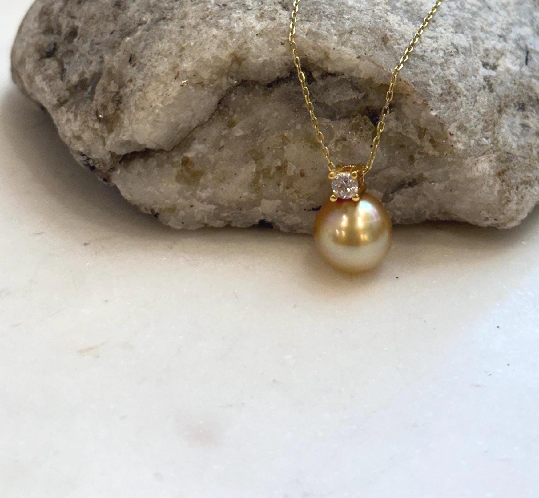 Genuine golden South Sea saltwater pearl pendant featuring a rich deep tea gold color.