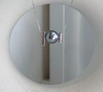 Elly’s double South Sea golden and Tahitian pearl pendant with genuine 8.3–8.9mm saltwater pearls.