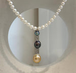 Genuine Tahitian and South Sea golden pearl pendant paired with a white freshwater pearl strand.