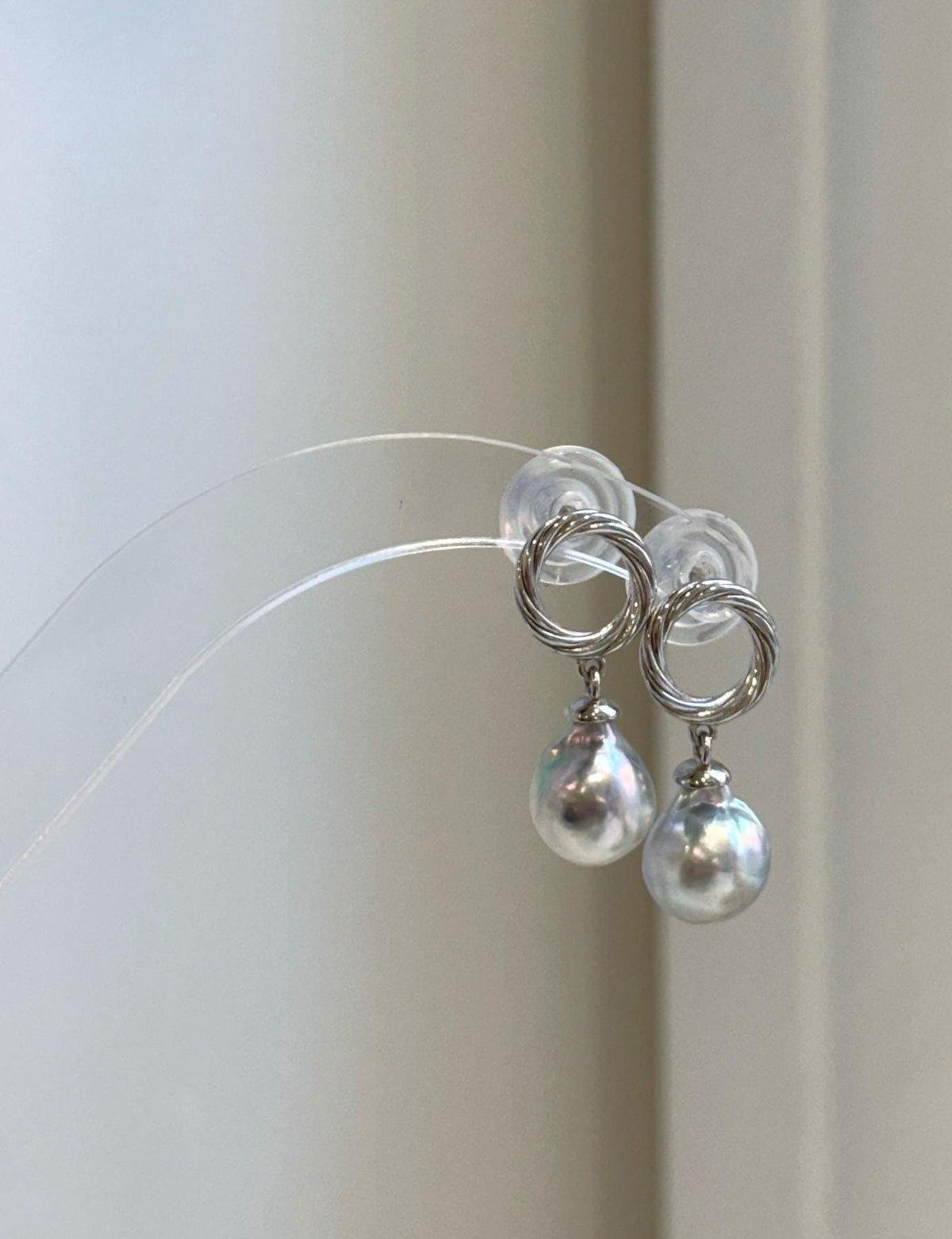 Genuine saltwater Akoya pearl earrings featuring luminous blue silver pearls