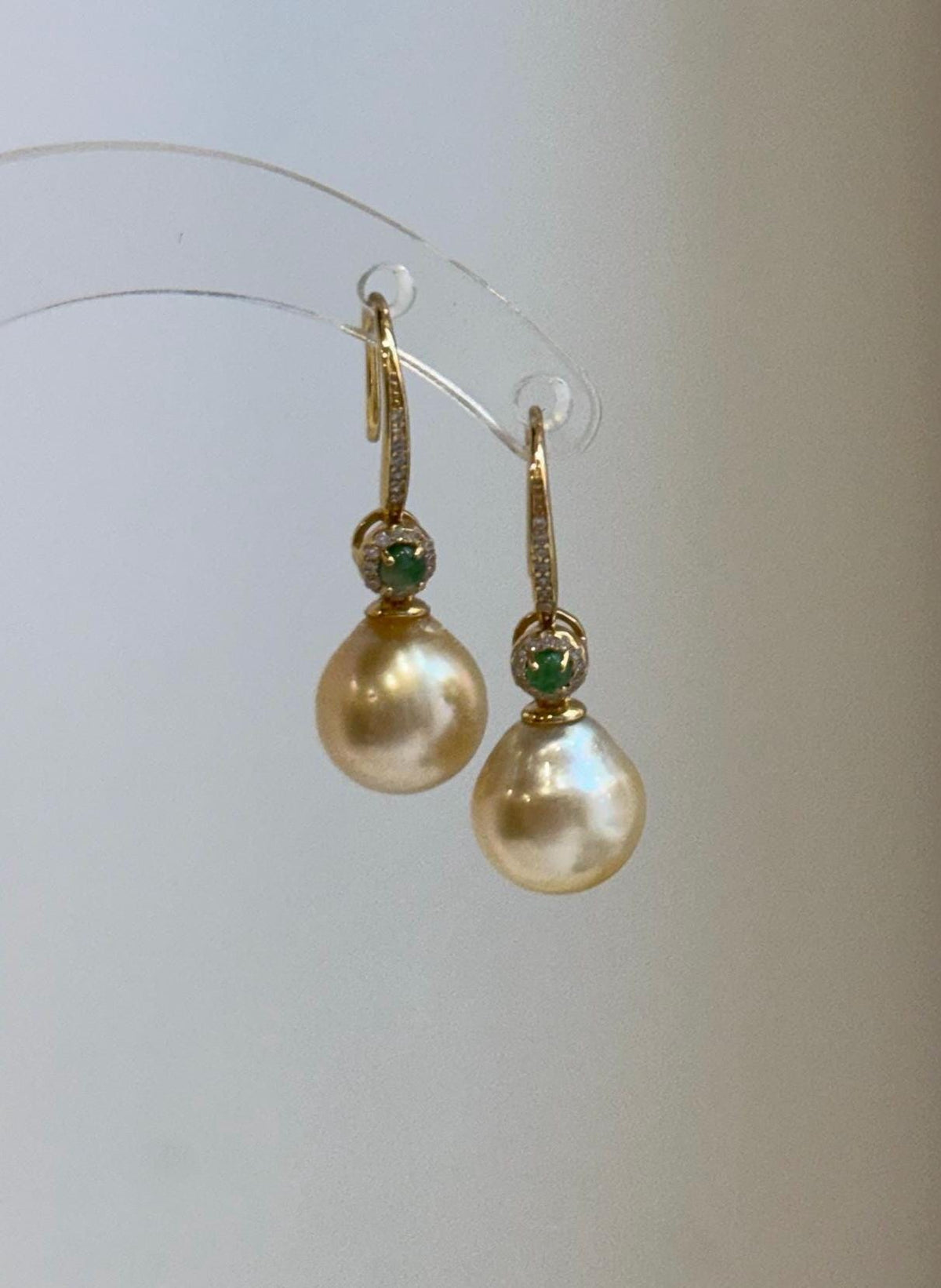 Luxury South Sea ultra gold pearl drop earrings featuring 9.4mm genuine ocean pearls.