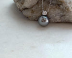 Elegant sterling silver Tahitian pearl pendant for anniversary gift.