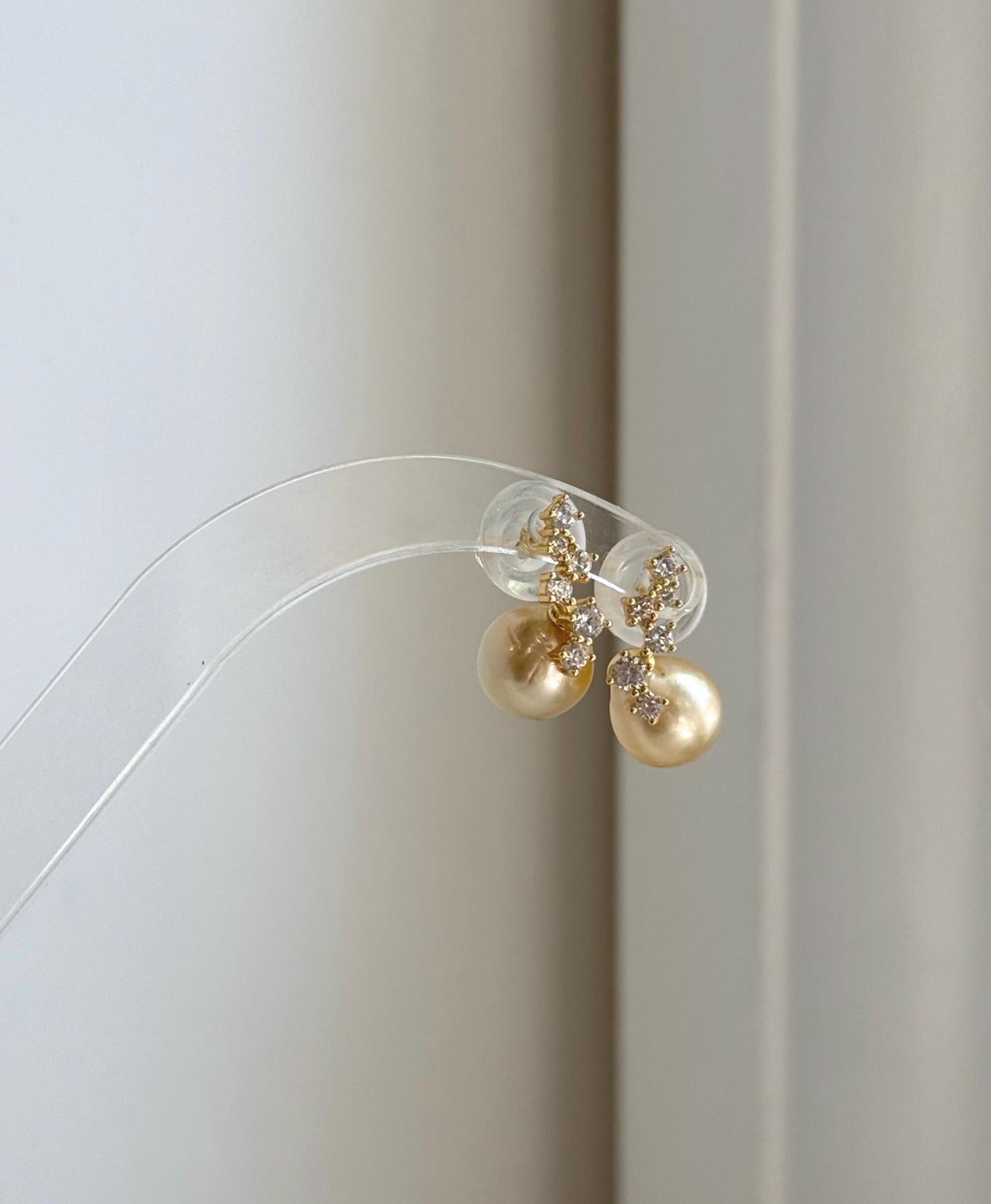 Premium mirror luster South Sea pearl earrings handcrafted with sterling silver.