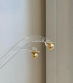 Genuine 8.8mm South Sea pearl earrings with rich natural golden color and elegant shine.
