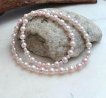 5. 5–6.5mm graduated pink pearl necklace made with genuine freshwater pearls and sterling silver.